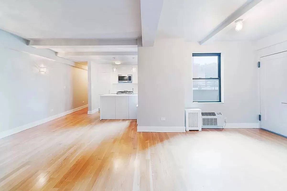 NEW ! This bright, spacious and renovated convertible 2 bedroom home offers a very generous floor plan with an L shaped living and dining room.