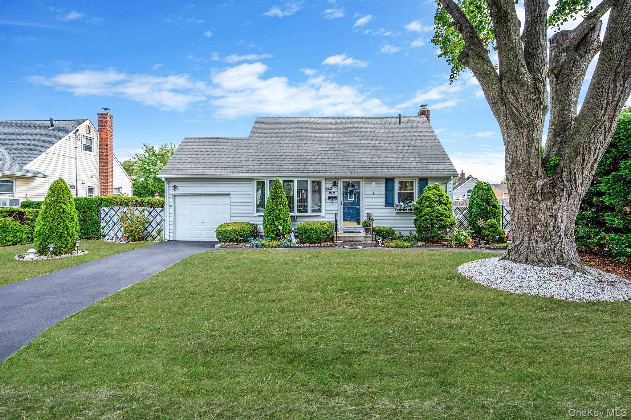 4 bedroom, 1 full bathroom Cape Cod style home in Lindenhurst Village with new central air conditioning and updated windows, siding, electric, oil burner and oil tank.