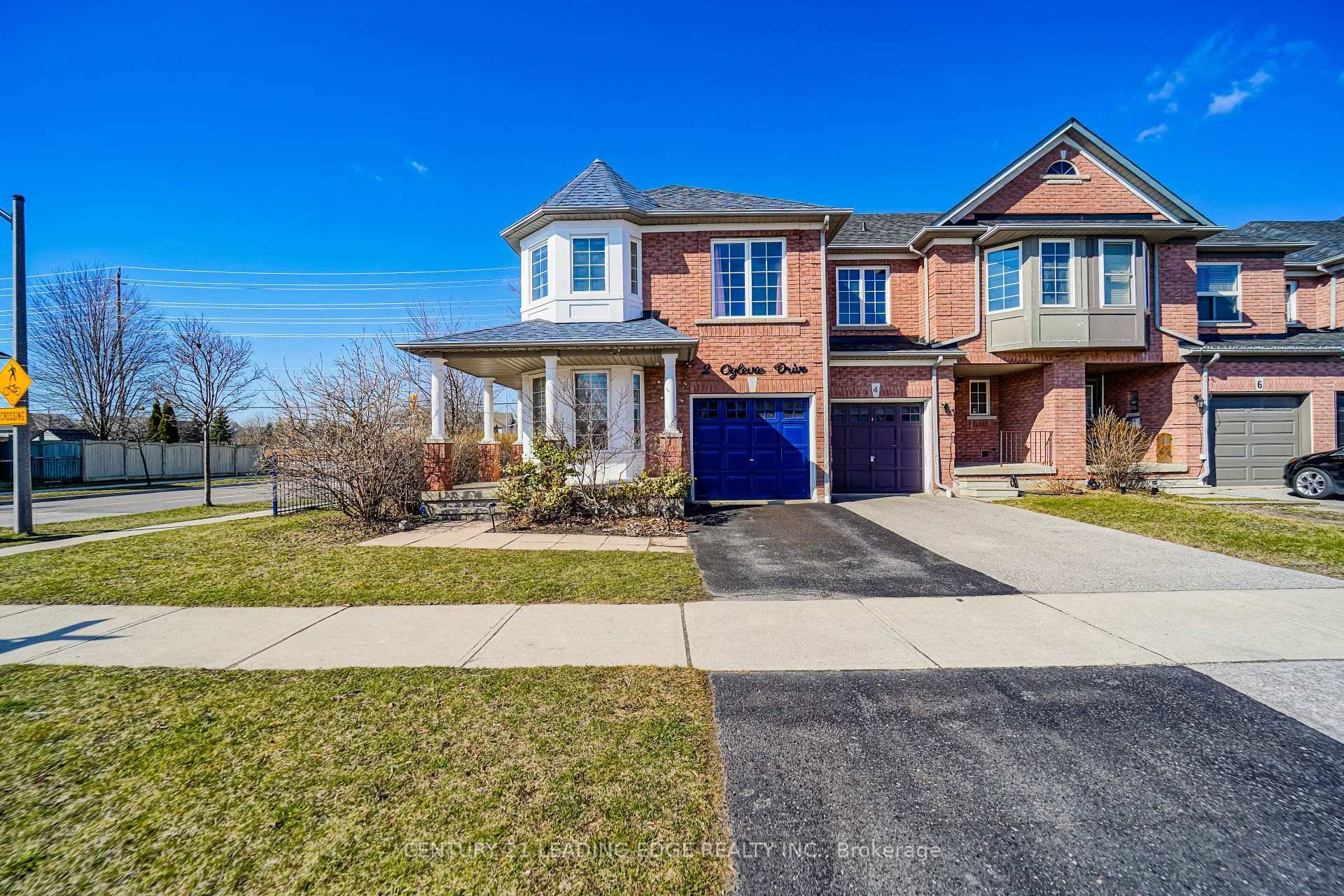 Stunning Freehold End Unit Corner Town Home Located In Sought After North Whitby Community.