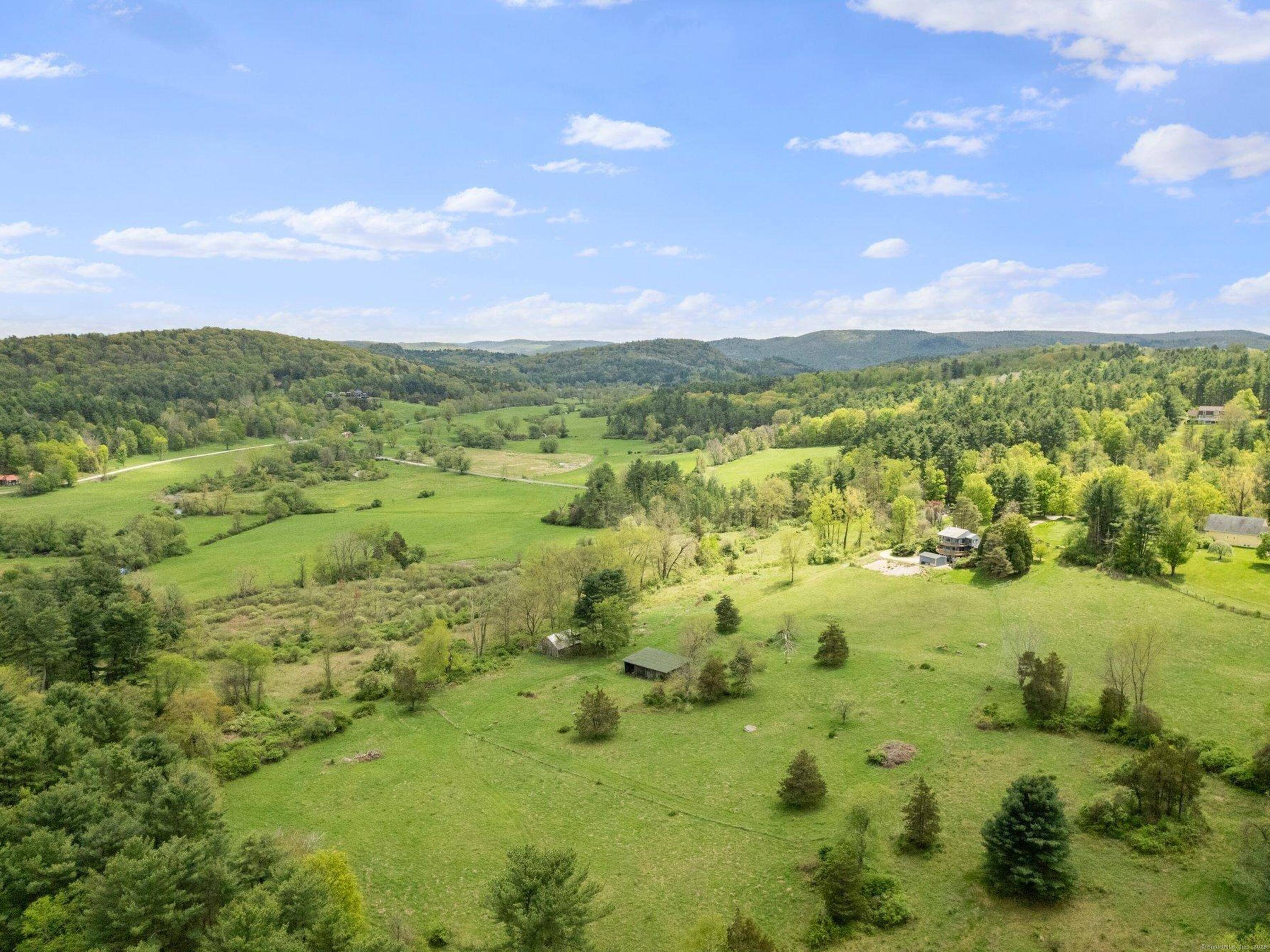 SALMON KILL VALLEY 147 ACRES Rarely does such a versatile and visually stunning property come to market.