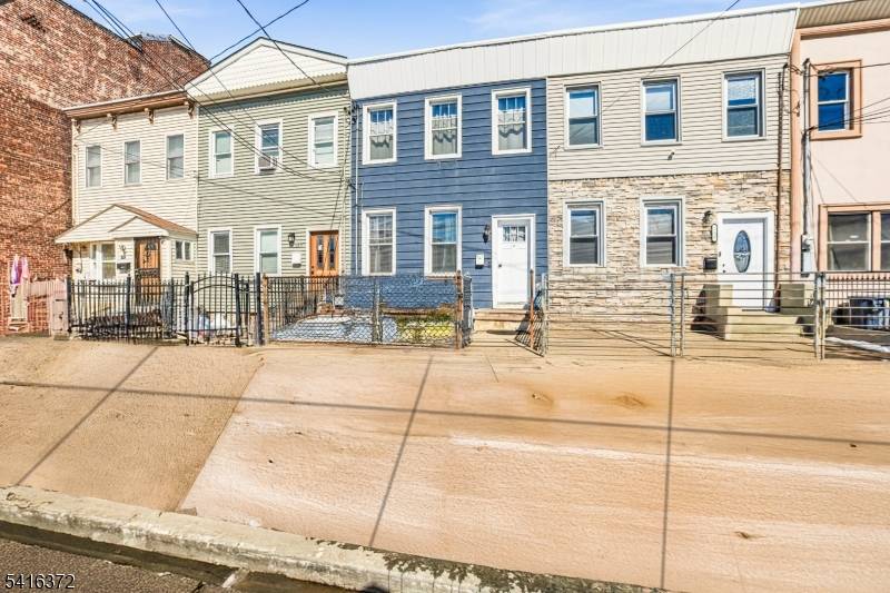 Welcome to 138 Broadway, a beautifully renovated townhouse offering modern style and comfortable living in Jersey City.