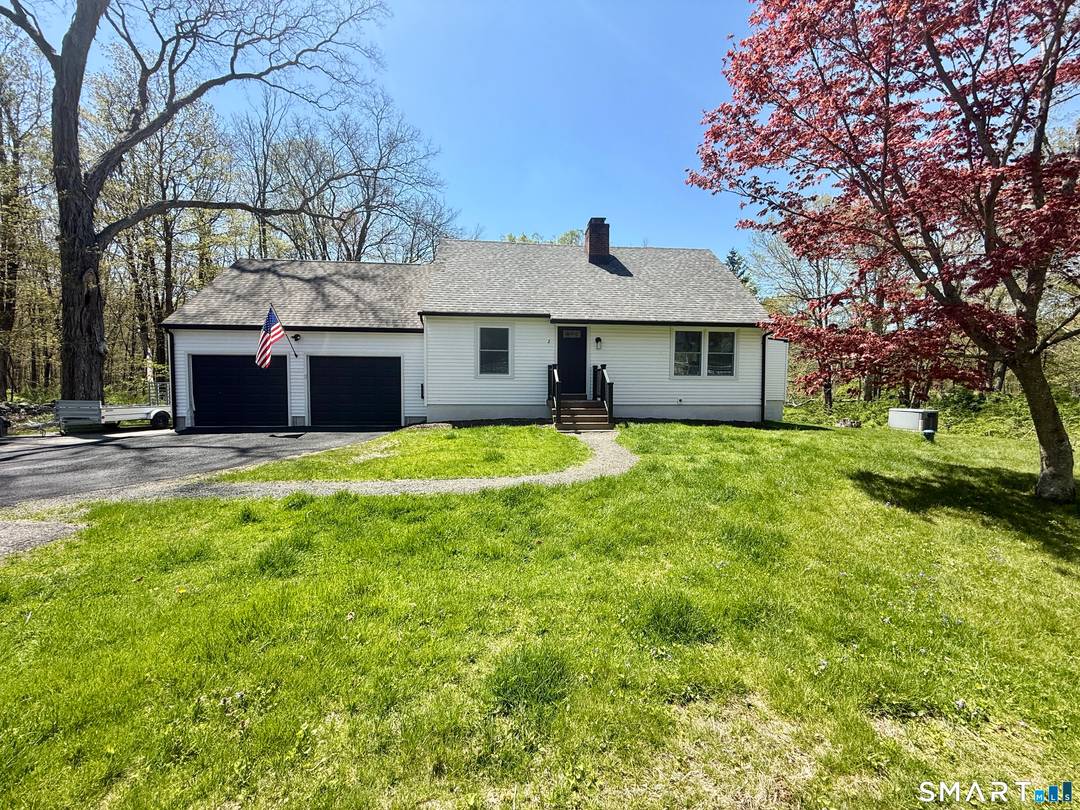 Charm and modern comfort come together in this beautifully renovated 3 bedroom, 2 bath home set on nearly an acre along a quiet country road in Woodbury.