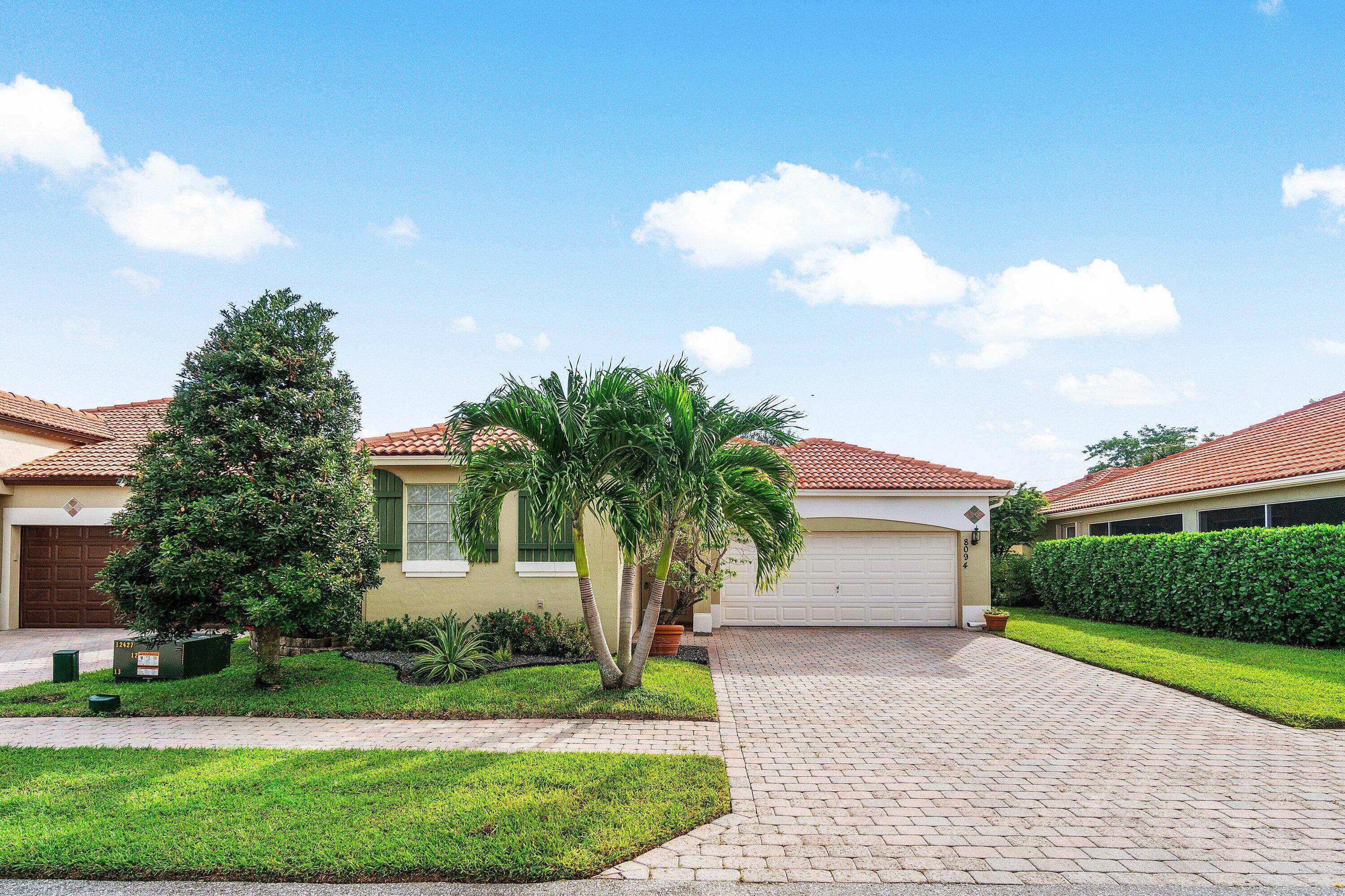 Welcome to this spacious 4 bedroom, 3 bath courtyard pool home located in the highly sought after community of Gateway Gardens.