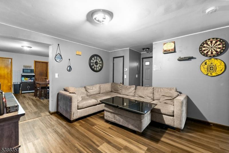 This 6 bedroom, 2 bath home is a rare find, offering generous living space and the convenience of on street parking.