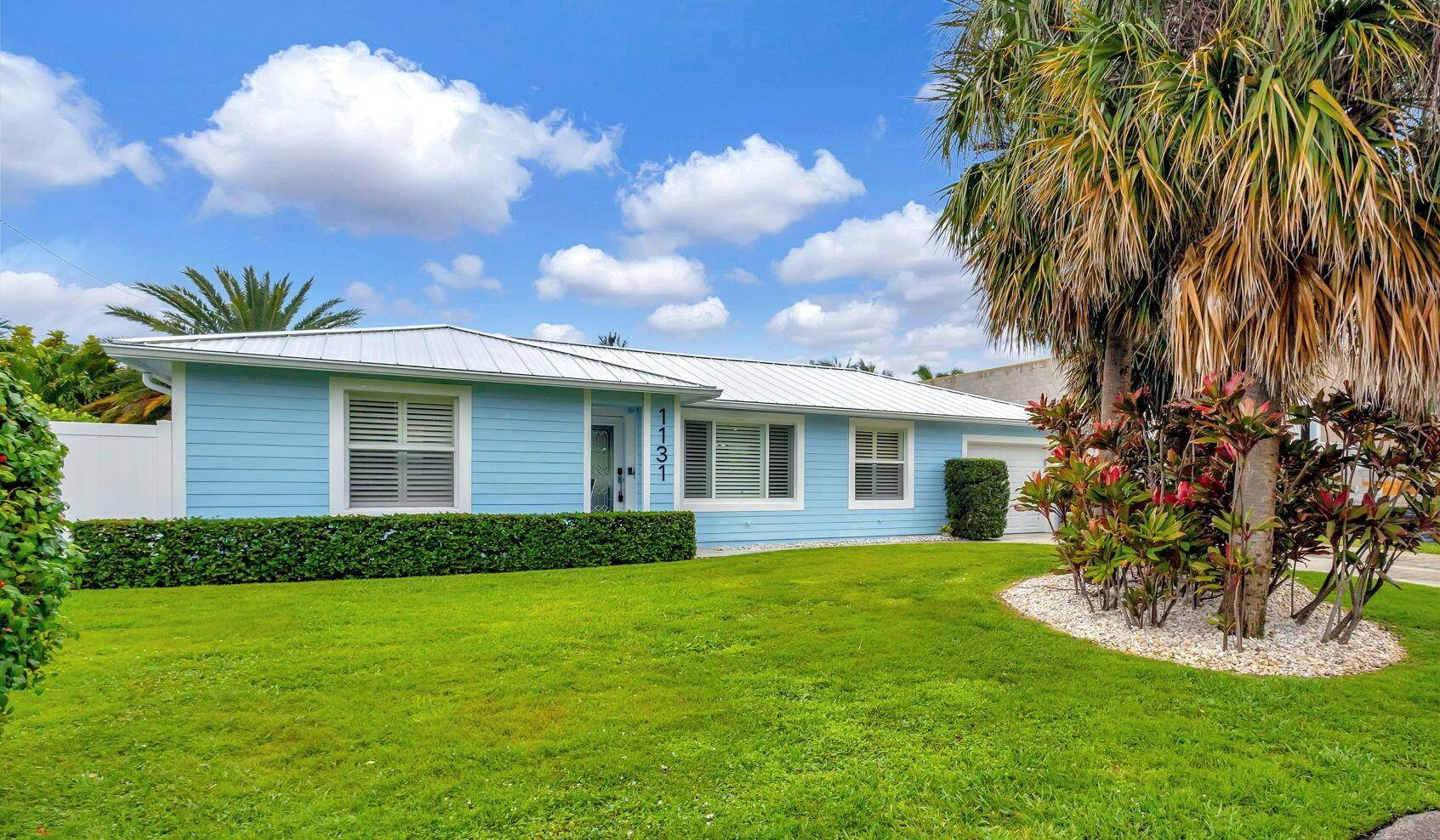 Move right into this impeccable, recently renovated, Yacht Harbor Estates home that includes include a beautiful modern custom pool with a travertine deck and new pool heater.