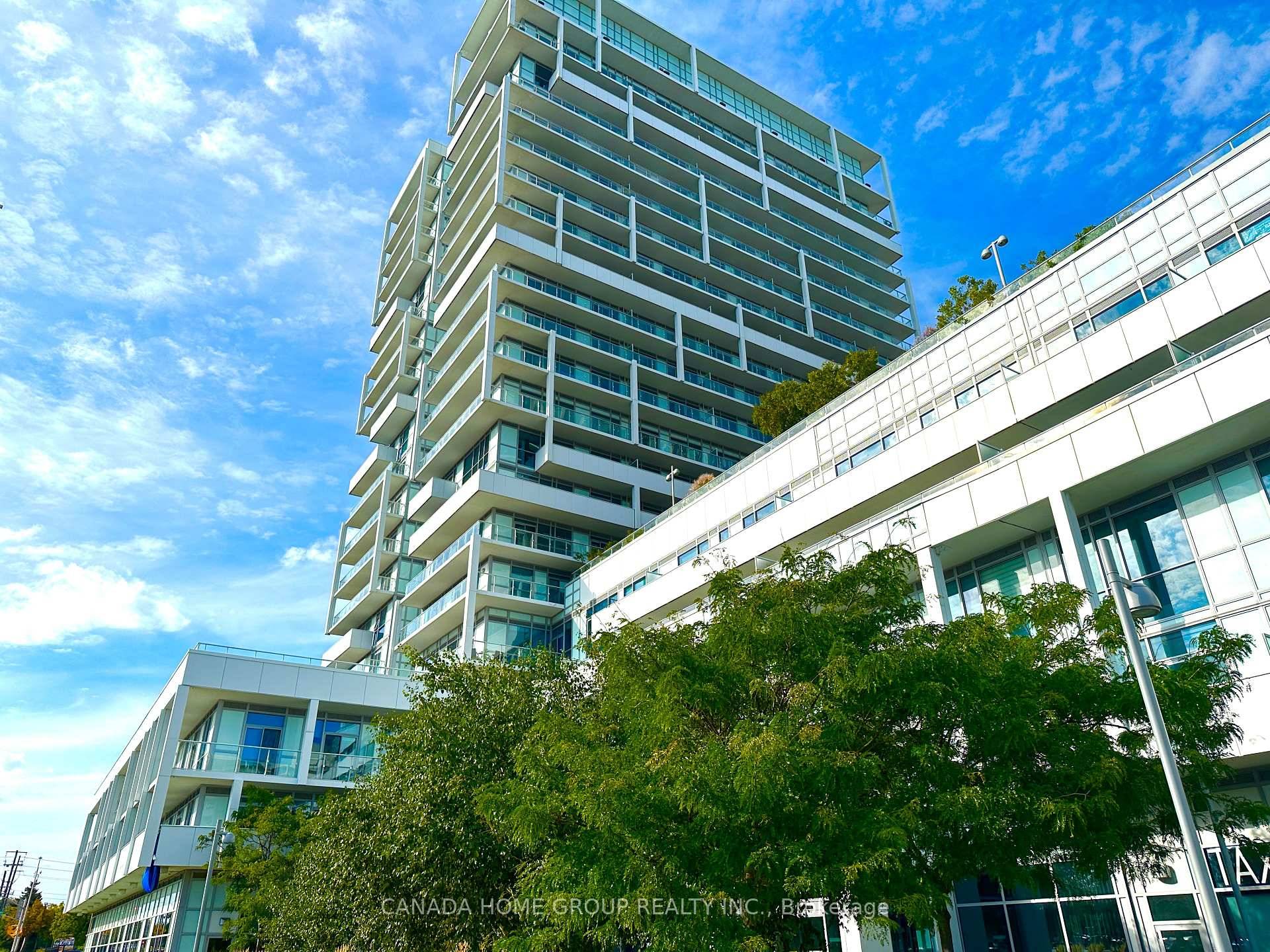 Spacious 1 Den Suite at Prestigious Rain Condos in the Heart of Kerr Village.