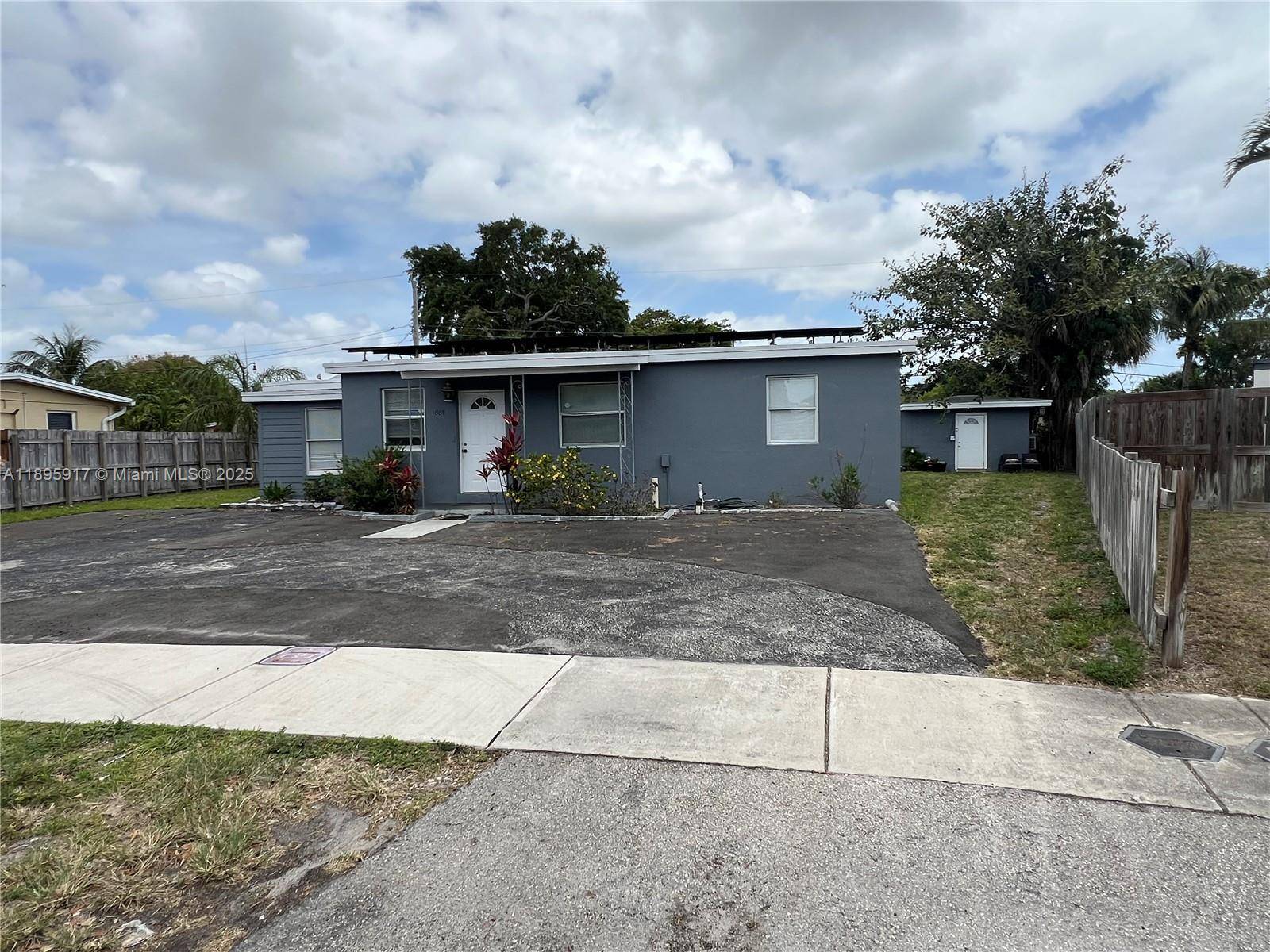 Income Producing Duplex Style Property with Solar Power !