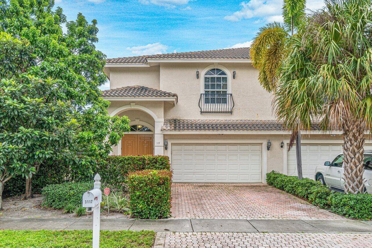 Big and Beautiful ! This spacious 2 story town home that lives like a house in Delray's Tropic Isle neighborhood is close to everything Delray !