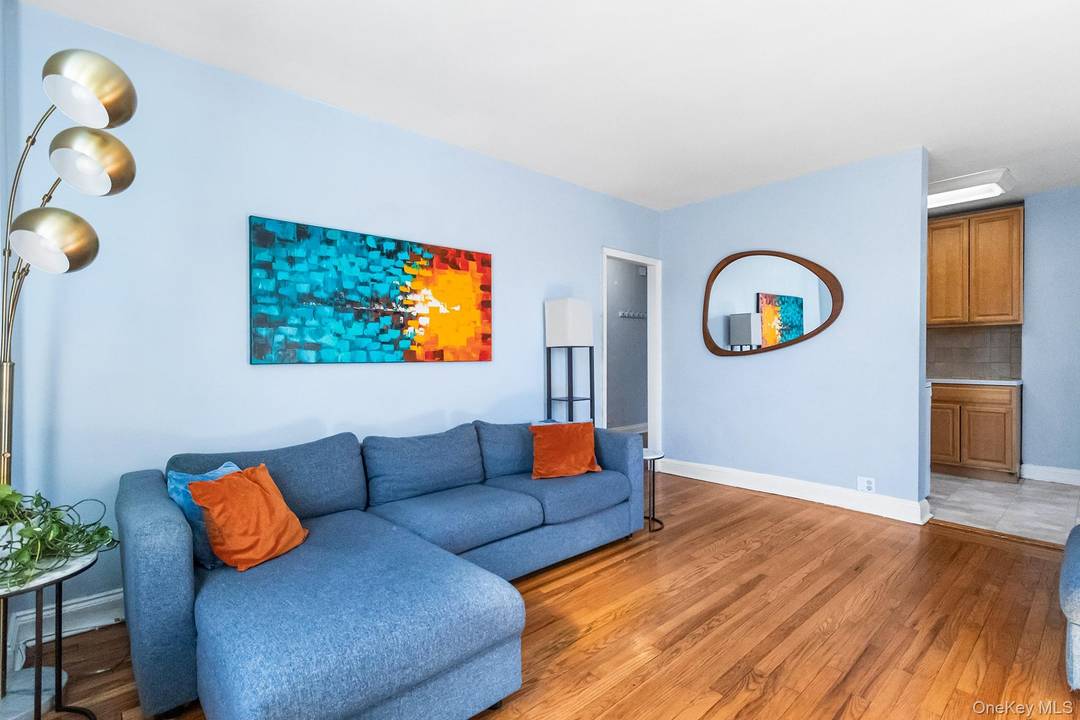 Welcome to this charming, sun filled second floor corner unit in the heart of Sunnyside and Woodside.