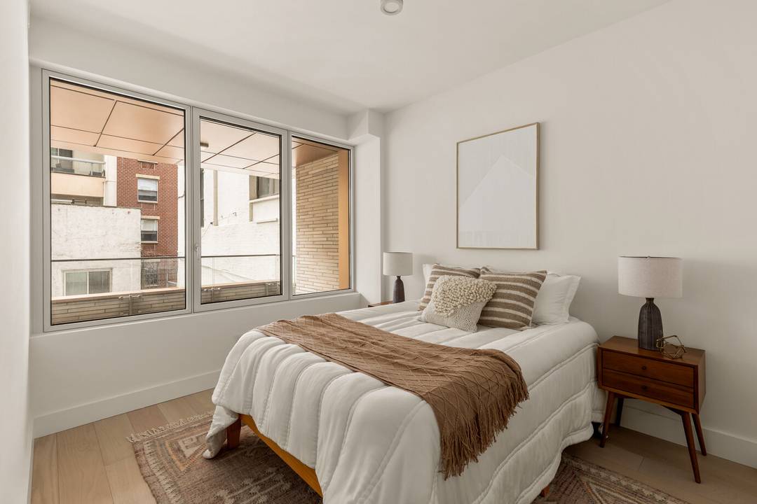 Introducing 208 Delancey a striking addition to the Lower East Side skyline, defined by its sculptural curved facade, rounded corner windows, and expansive balconies that invite light, air, and views ...
