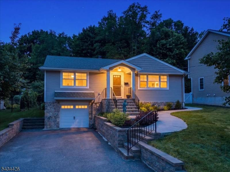 This beautiful ranch is move in ready, and thoughtfully redesigned with an addition that expanded the home to include a spacious family room dining area and private primary suite.