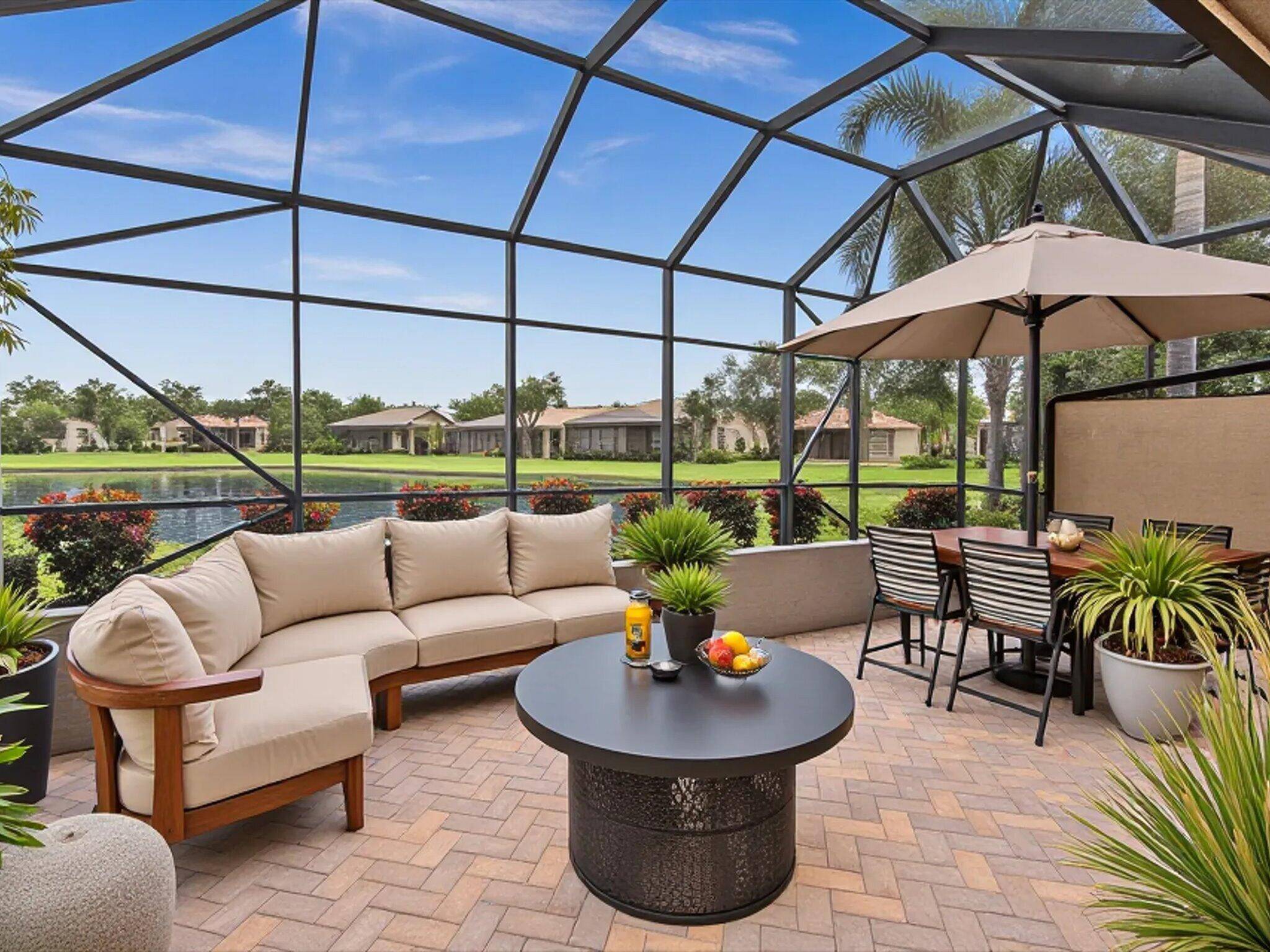 Situated on a premium oversized lakefront lot, this desirable Gibraltar model boasts an expansive open triple split floor plan with 3 bedrooms, 2.