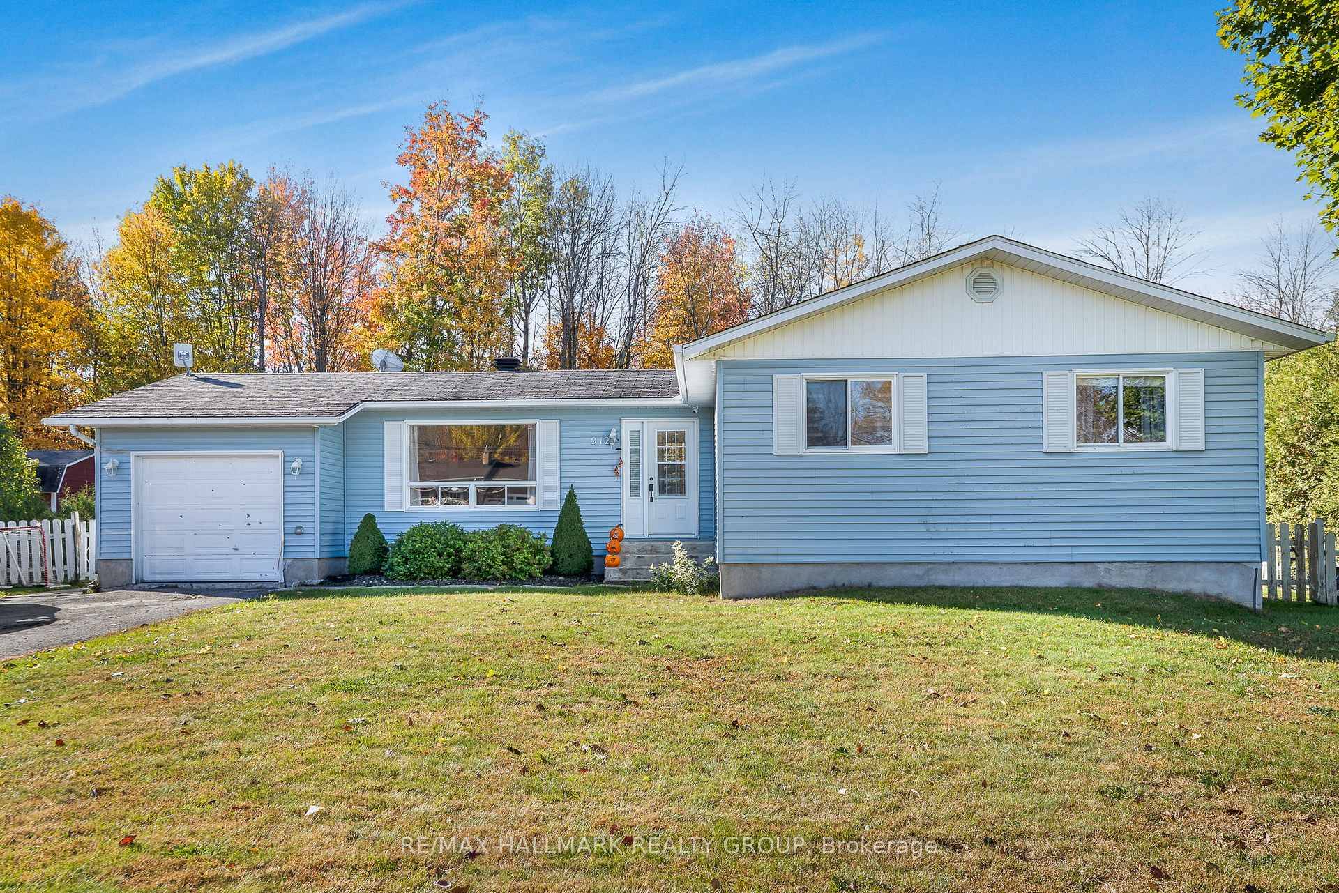 Nestled in a peaceful country setting with no rear neighbors, this charming home backs onto a wooded area while remaining just five minutes from town.