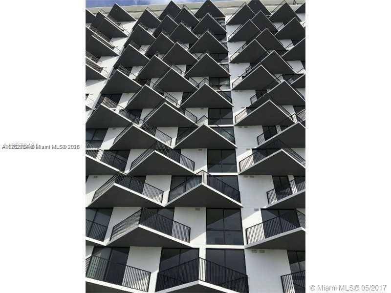 Amazing Corner unit 2 bed 2 bath amp ; Den, partial golf view 5252 Paseo in Downtown Doral.
