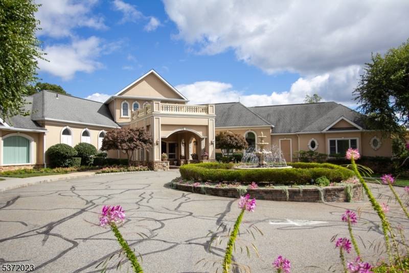 Check out this spacious corner model in the desirable private gated community at FOX HILLS !