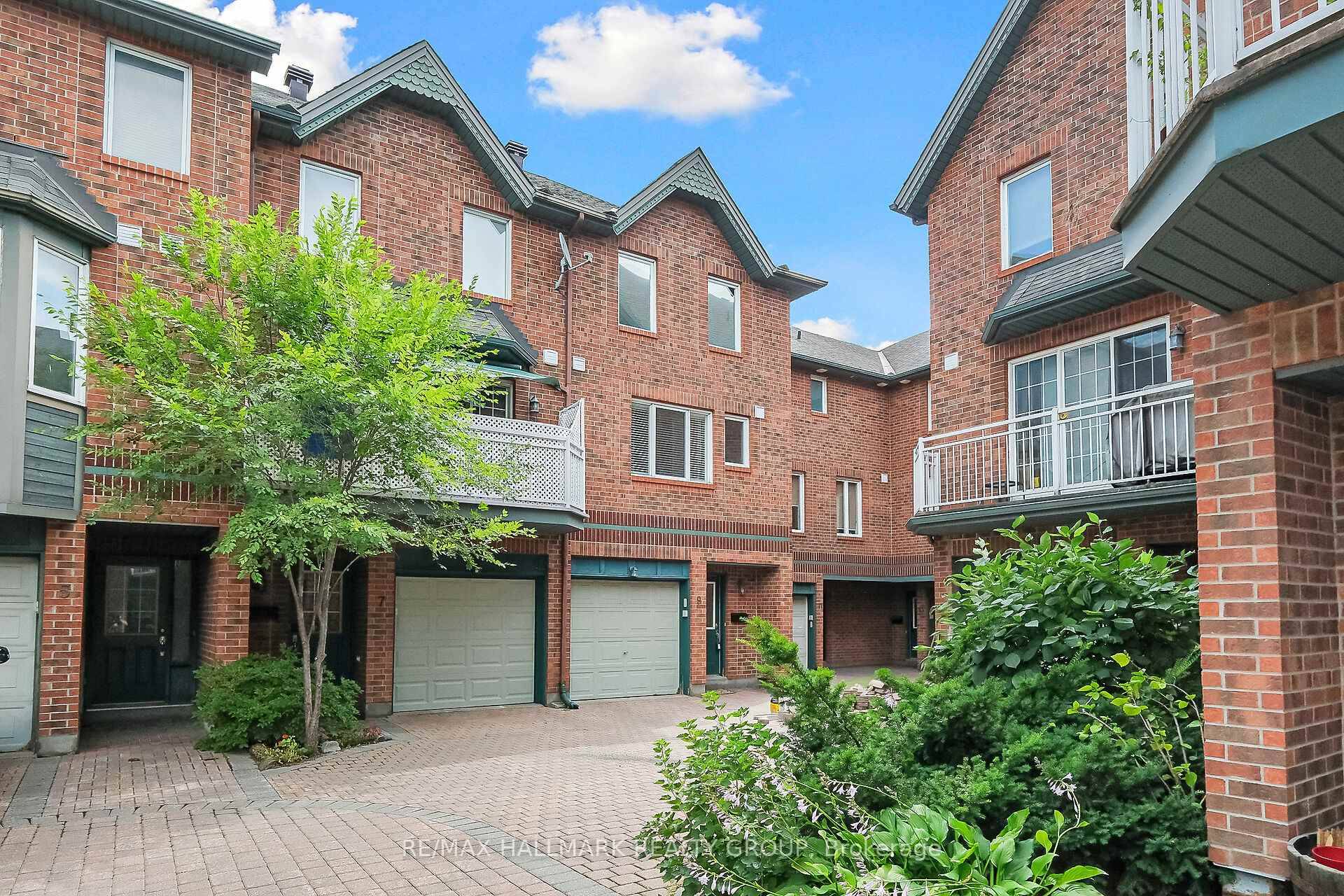 This freehold executive end unit townhome is an urban paradise !
