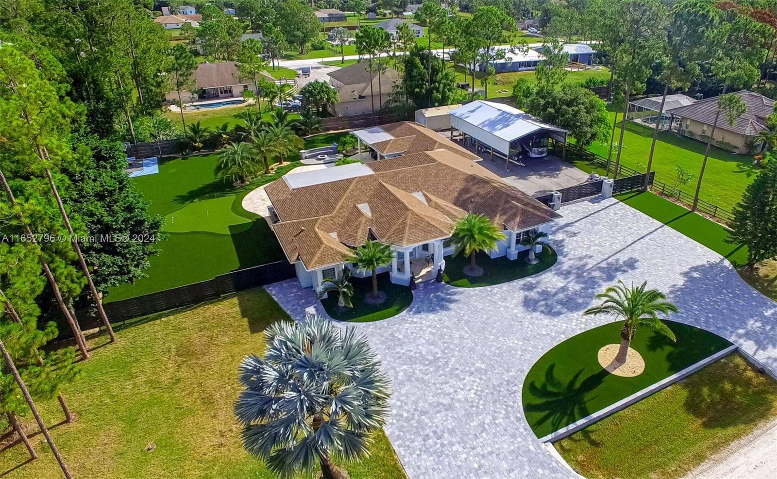 THIS IS YOUR DREAM HOME. This breath taking, state of the art residence is paradise on earth.