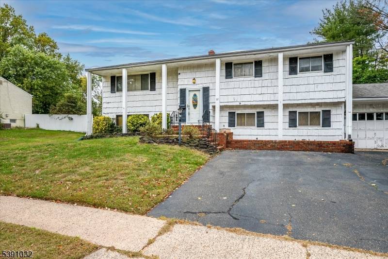 Spacious Bi Level in Need of Renovation Investor or 203k Buyer Opportunity to update and customize to their style.
