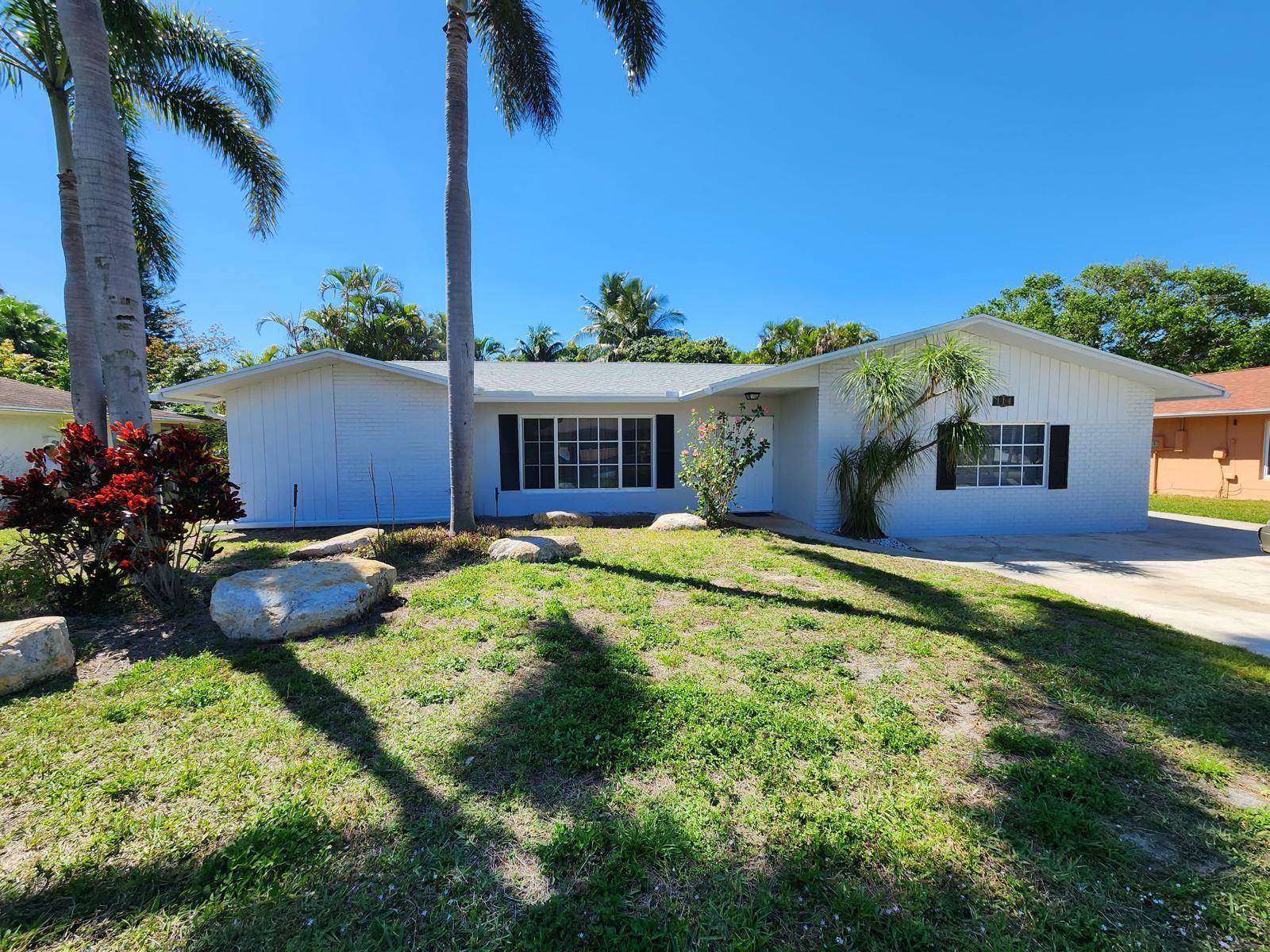 Welcome home to this 4 bedroom, 3 bath renovated home in the desirable non HOA community of La Mancha in Royal Palm Beach !