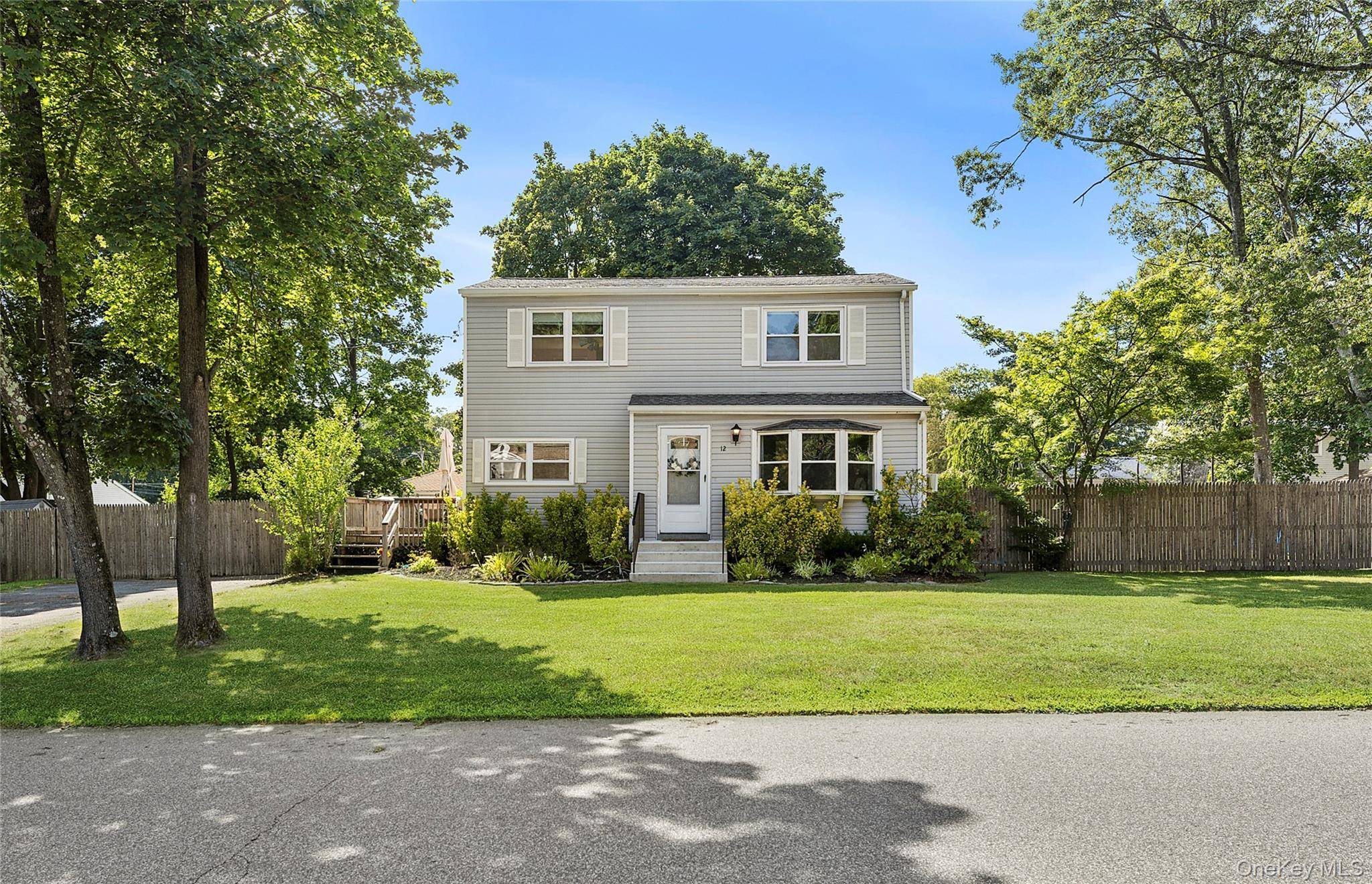 Welcome to 12 Lakeview Dr in Middle Island !