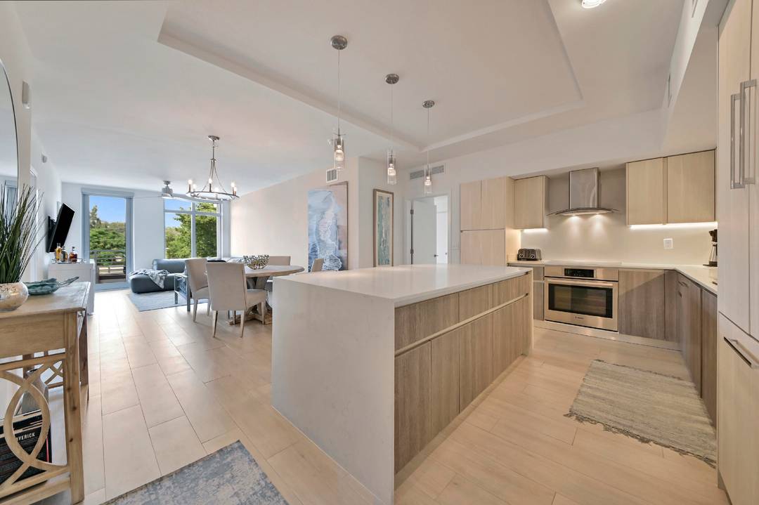 Experience contemporary living in this stunning West facing 2 bedroom, 2 bath condo featuring three private balconies perfect for taking in breathtaking sunsets.