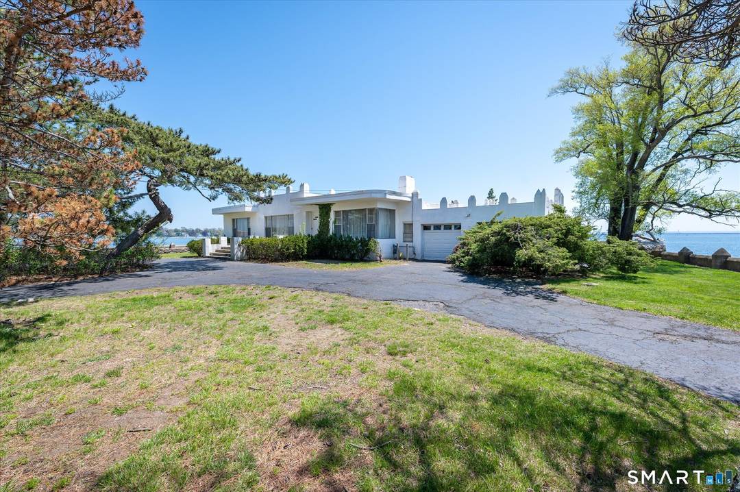 Set on 1. 68 extraordinary acres at the end of Davenport Drive, this waterfront peninsula property offers a rare chance to reimagine and transform an existing residence into a custom ...