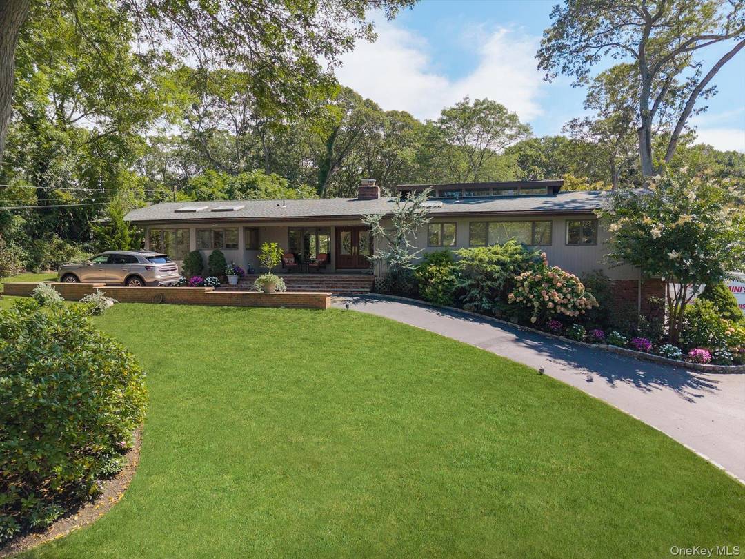 Welcome to this stunning 4 bedroom, 3 bathroom residence, perfectly situated in the quintessential Tuxedo Hills neighborhood of Melville.