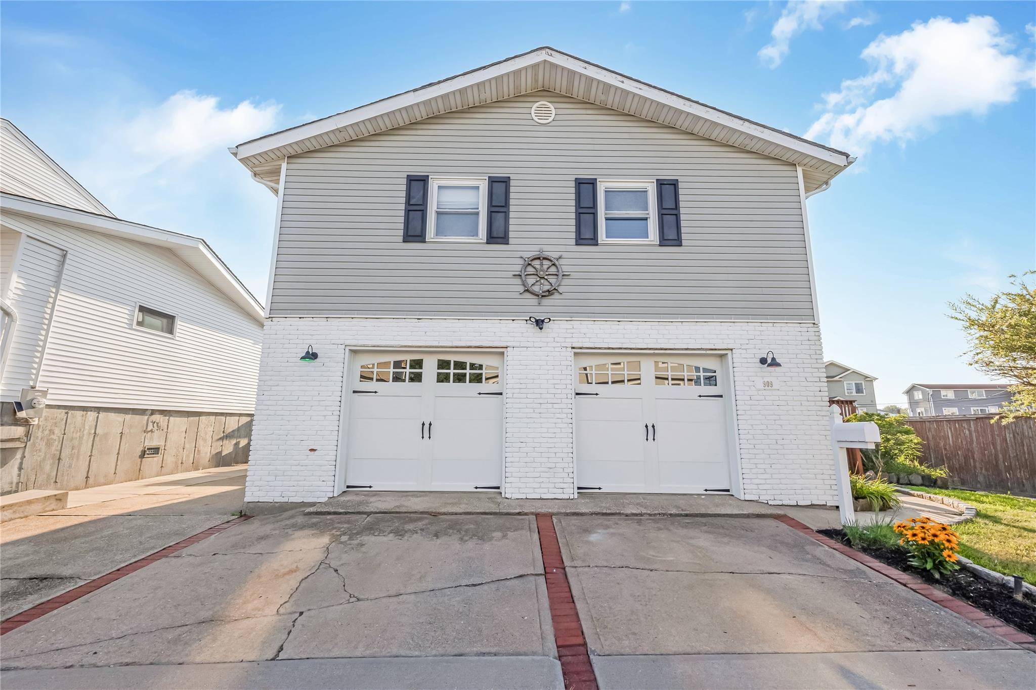 Stunning High Ranch on the Canal Just 3 Houses from the Open Bay !