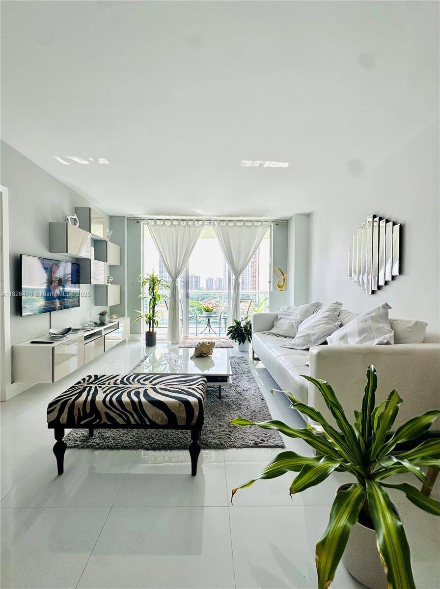 Motivated seller. Completely renovated bright and spacious residence with an unobstructed intracoastal and city view across the street from the Atlantic Ocean.