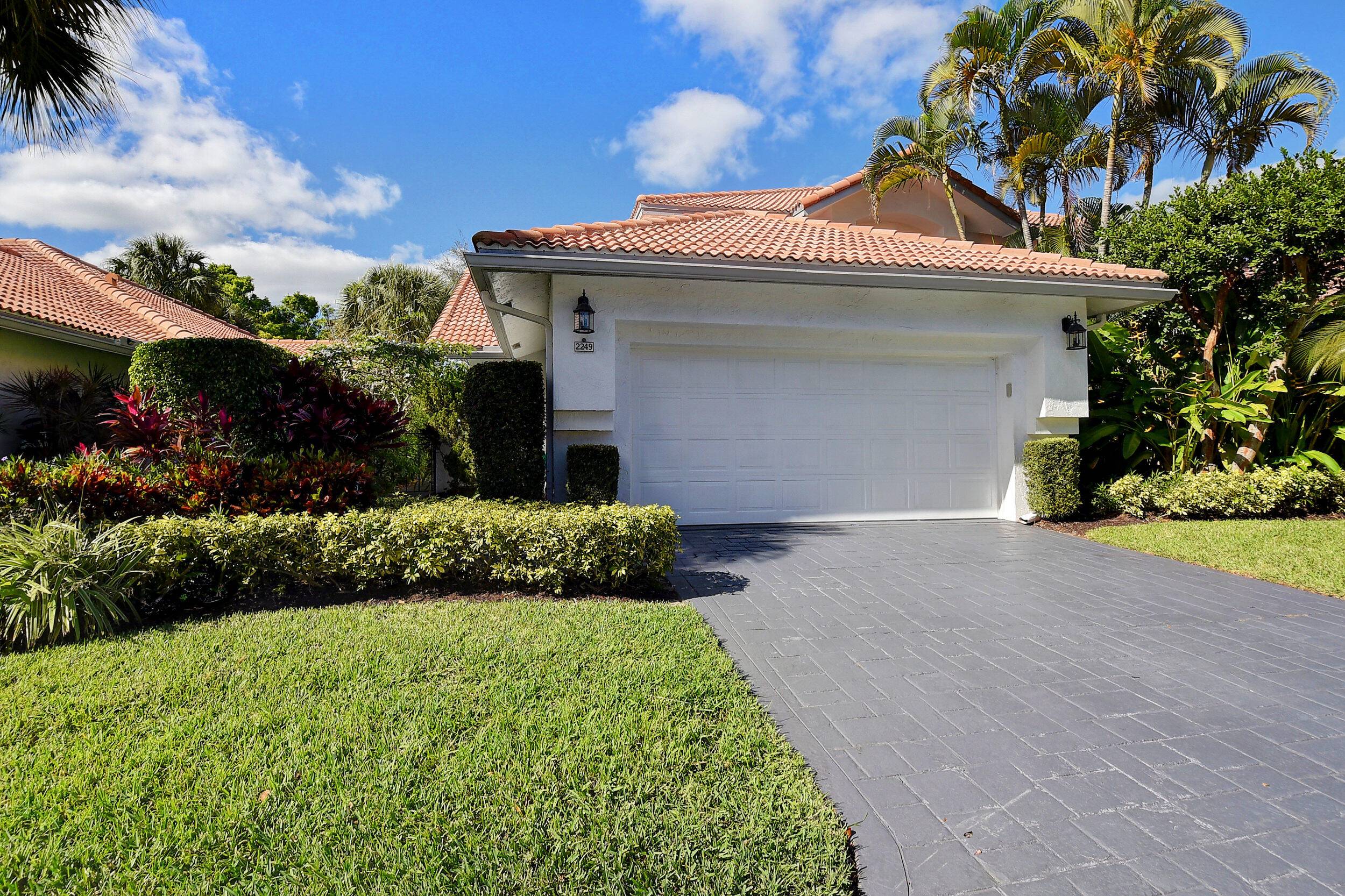 MAKE THIS BEAUTIFULLY UPDATED THREE BEDROOM, THREE AND ONE HALF BATH HOME WITH A MAGNIFICENT GOLF COURSE VIEW YOURS !
