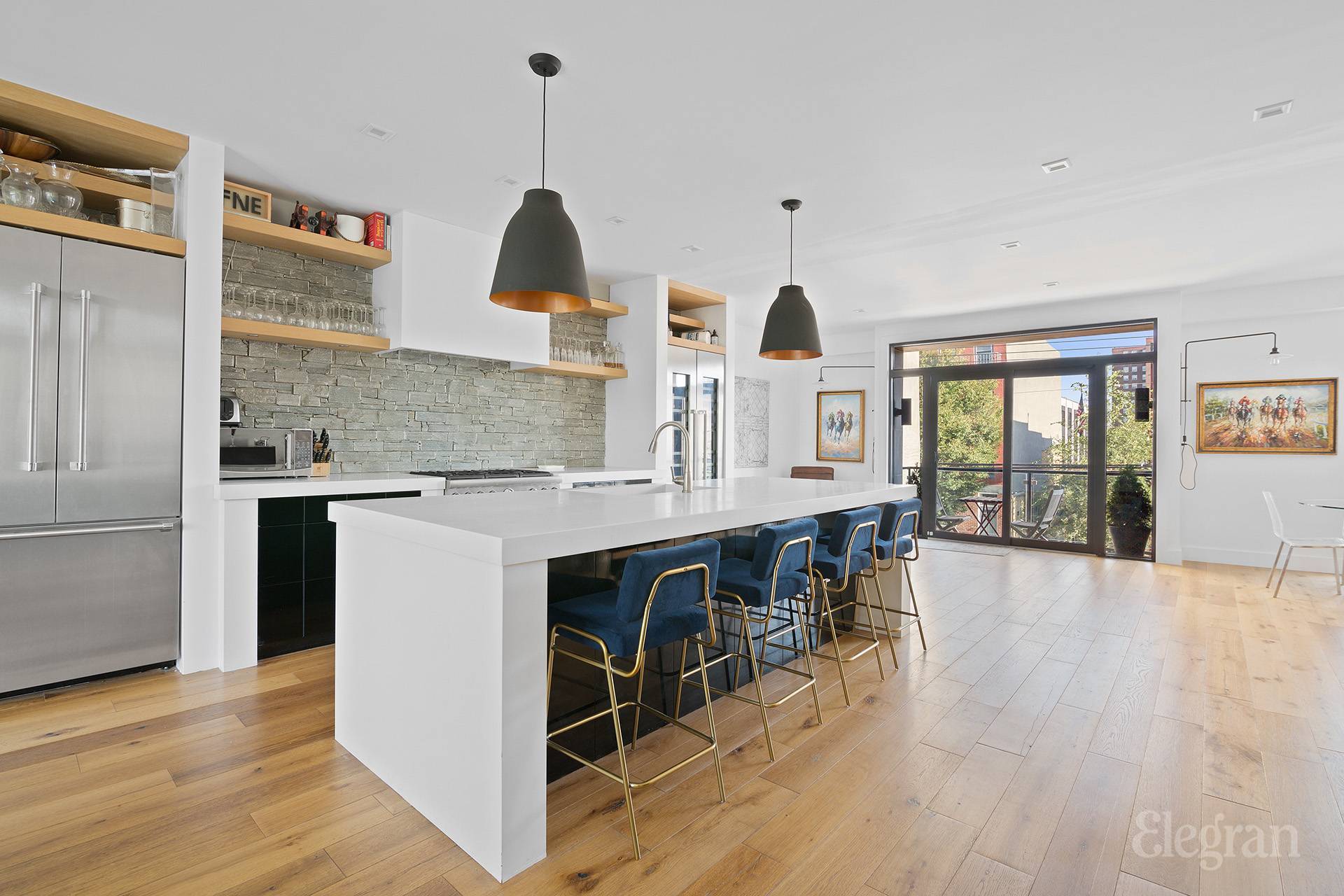 You will fall in love with this 1900 sq ft bright and welcoming duplex flooded with light from both East and West exposure.