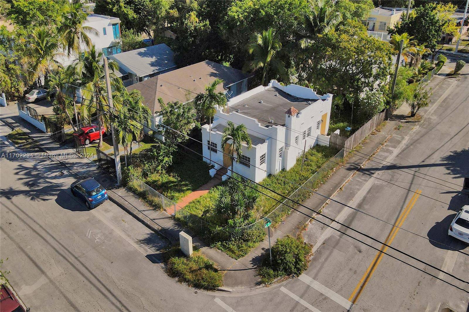 Bring your builder ! Corner lot zoned for multi family with APPROVED demo and building permits.