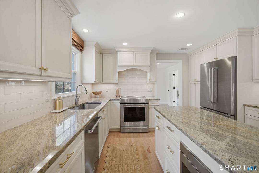 Welcome to this beautifully maintained 4 bedroom, 2.