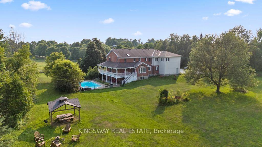 Welcome to 14141 Dublin Line, Where Luxury Meets Lifestyle of 6119 sq ft of total living space on Over 9 Acres of Pure Country Perfection.