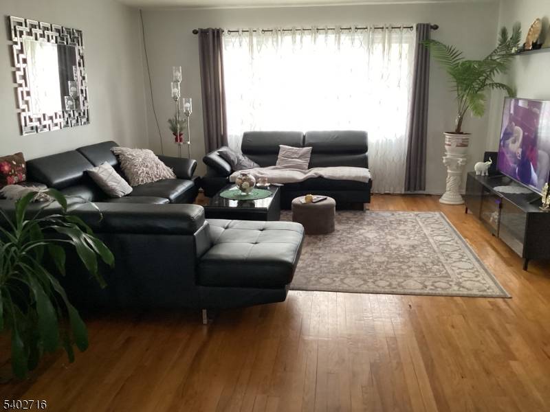 Discover this charming and well maintained single family duplex, in desirable Elmwood Park area.
