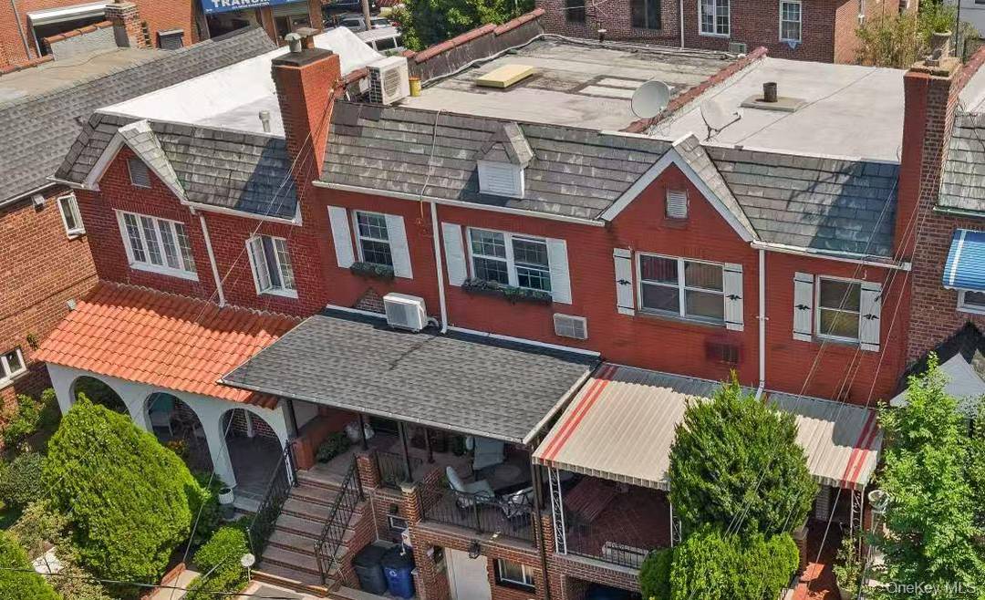 Welcome to this meticulously maintained brick attached rowhouse, single family residence nestled in the vibrant heart of Woodside, Queens.