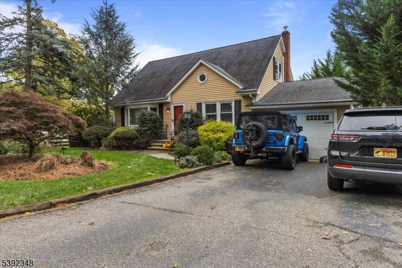 Charming Cape Cod with Great Curb Appeal !