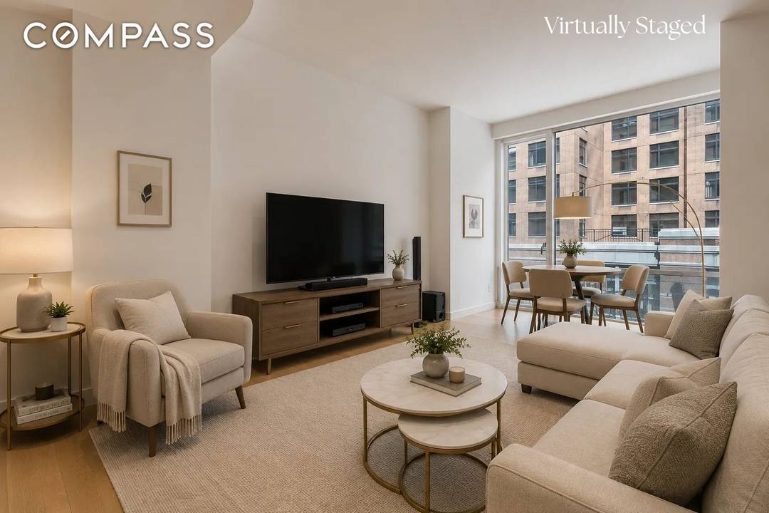 Experience refined SoHo living in this exceptional 2 bed, 2 bath loft at Unit 4D, 311 West Broadway.