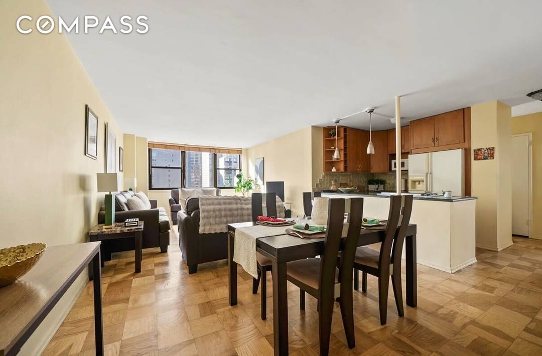 Welcome to Residence 10N at The Crescent a sun drenched corner 2 bed, 2 bath home with city views.