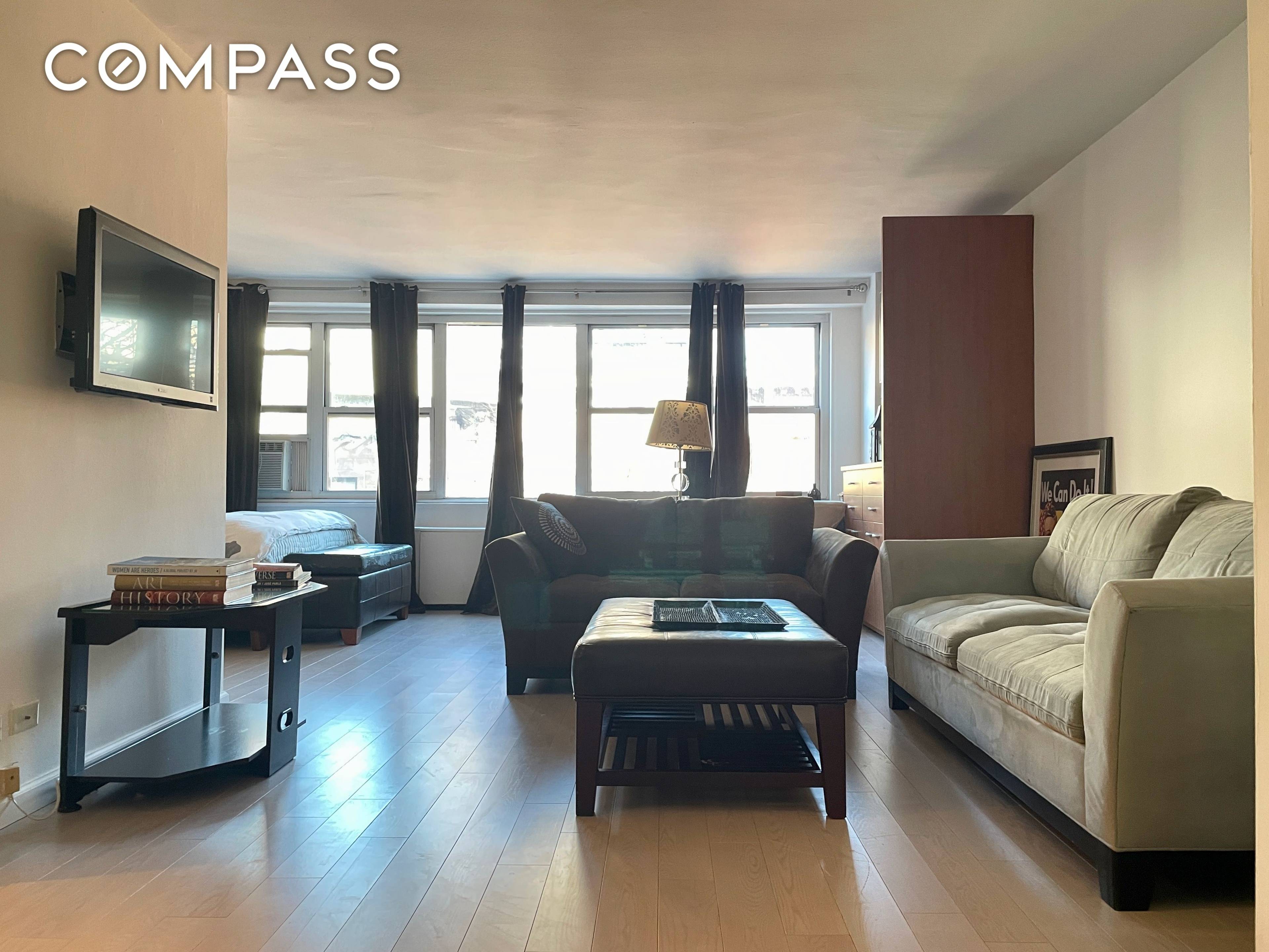 This studio feels much larger than it is, with a one bedroom sized open living dining work area, a separate kitchen and a sleeping alcove that comfortably accommodates a queen ...