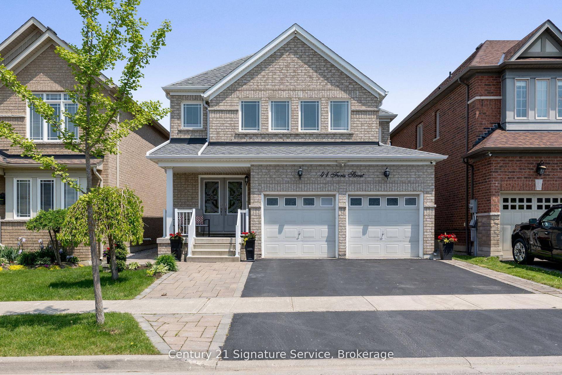 This exceptional home boasts a meticulously landscaped exterior that sets the tone for the elegance found within.