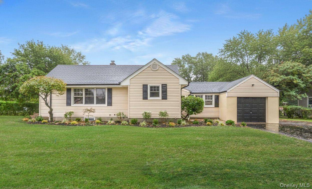 Welcome to 40 Irving Johnson Street in East Northport, a beautifully renovated home that perfectly blends classic charm with modern comfort.