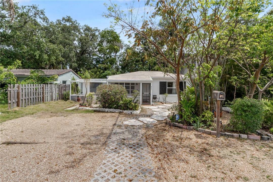 Located in highly desirable Tarpon River, this 3 bedroom, 2 bath single family home blends character, warmth, and inviting indoor outdoor living.