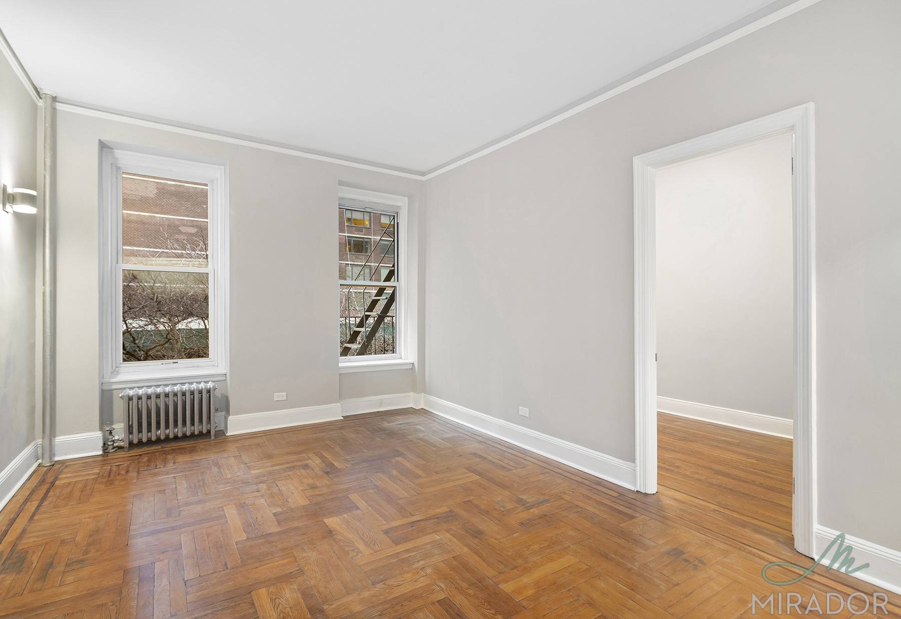 This is a newly renovated 1 br featuring hardwood floors, east facing super bright high ceilings, entry foyer, and newer kitchen and bathroom.