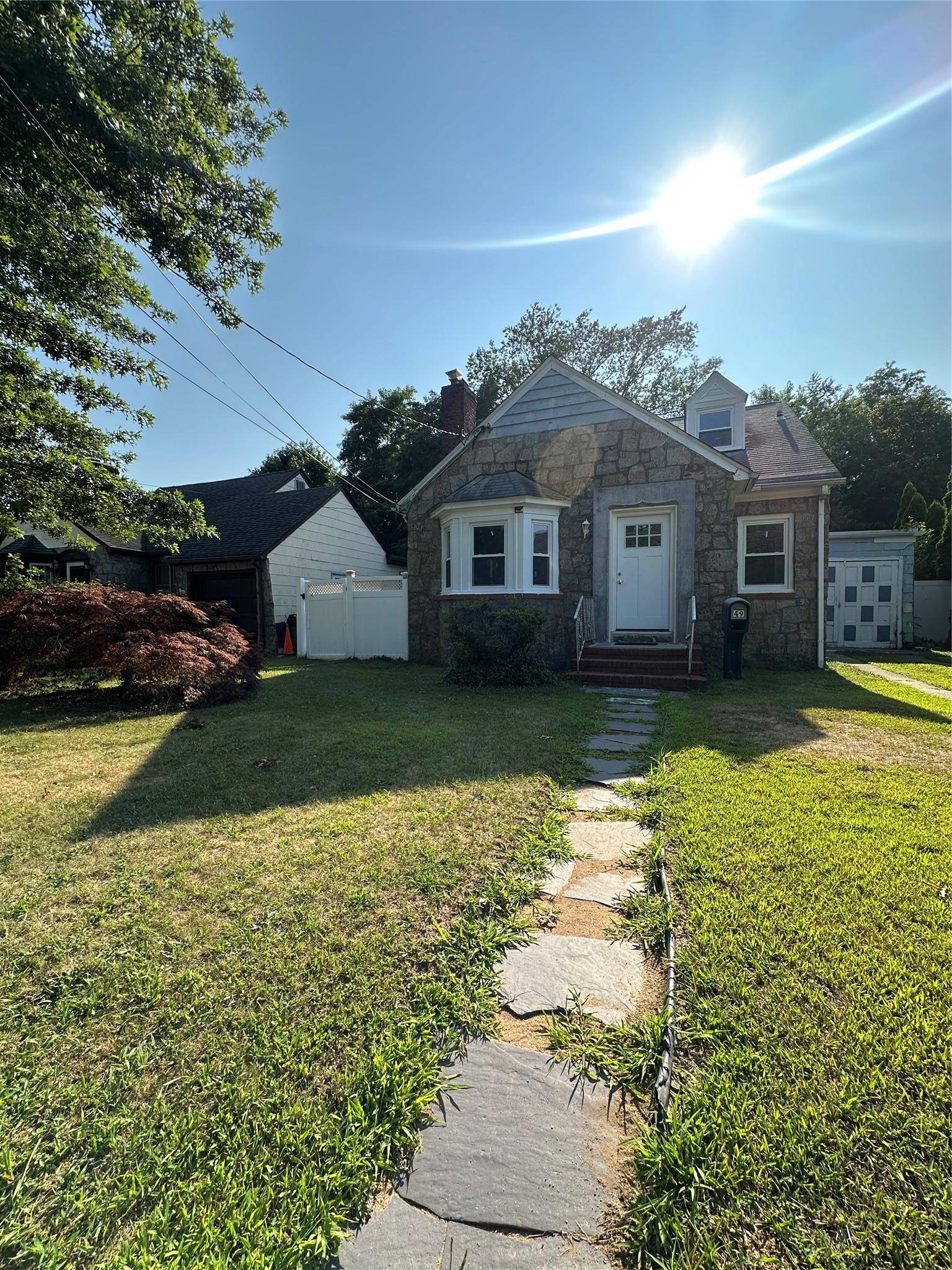 Welcome to this charming Cape style home nestled on a quiet cul de sac, offering timeless character combined with exciting recent upgrades.