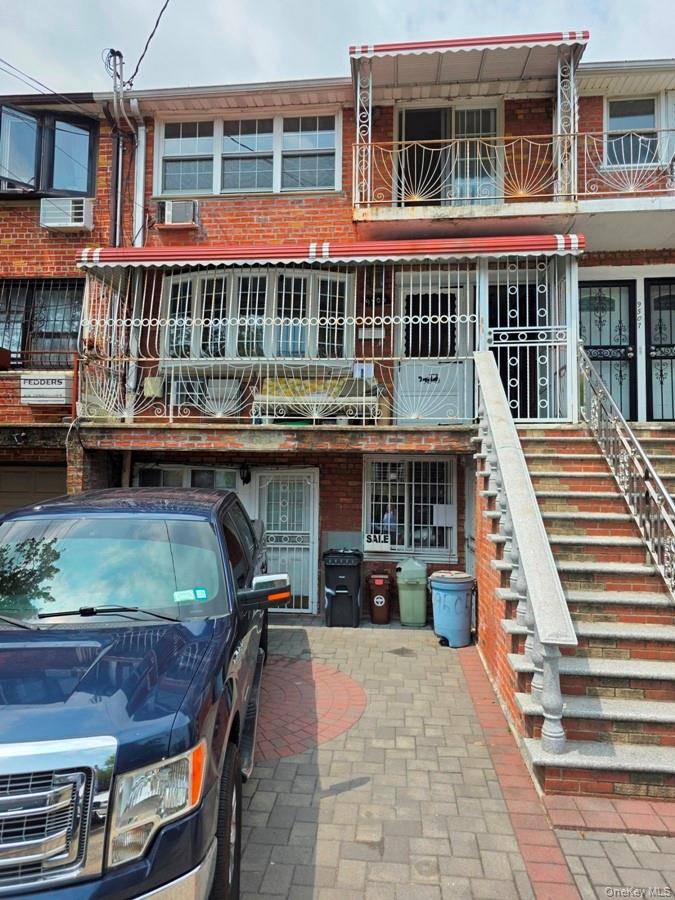 Brick 2 family 4 story basement plus 3 floors.