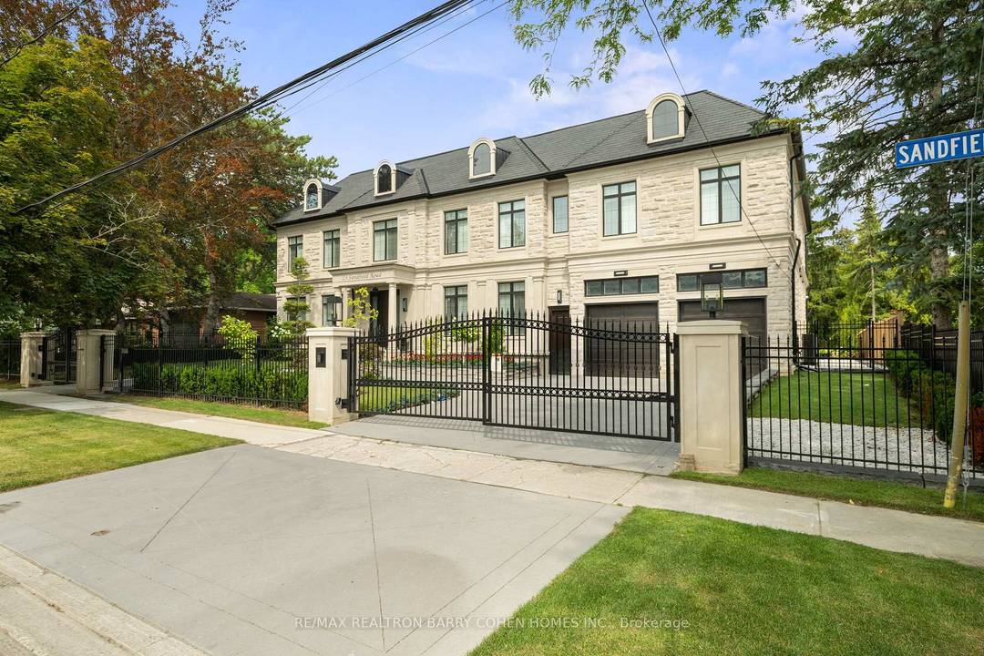 Masterfully Designed Palatial Custom Estate Situated On An Exceptionally Private, Double Gated, Tree Lined Lot With 100' Lush Frontage amp ; A Circular Heated Driveway In The Prestigious amp ; ...