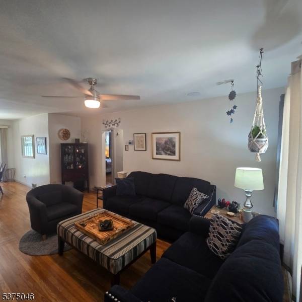 LOCATION, LOCATION..... Step into this charming white picket fenced home that blends comfort, style, and convenience.