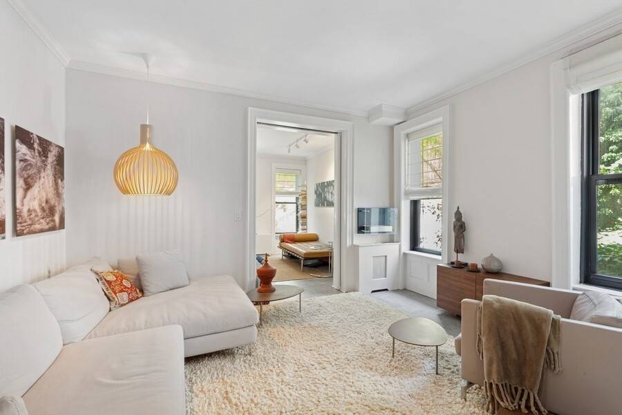 Featured in Architectural Digest, this impeccably maintained and uniquely designed home offers a serene blend of classic charm and modern sophistication an oasis tucked away in the heart of Chelsea.