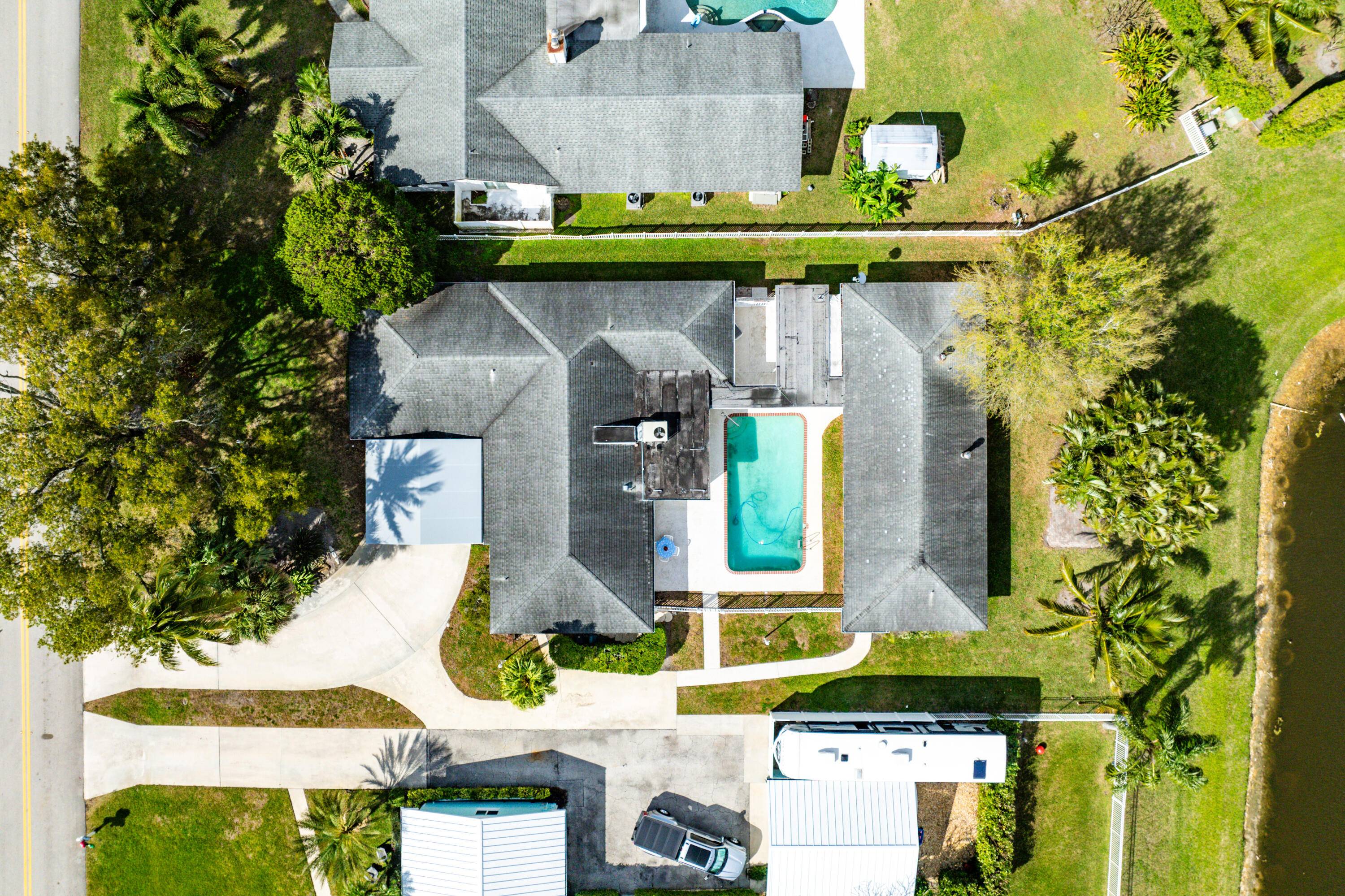 This former model home, located in the heart of Palm Beach Gardens, features 2 homes well maintained by its original owner.